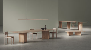Wooden tables and chairs in a modern room.