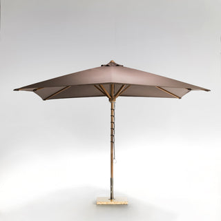 Brown patio umbrella with wooden pole.