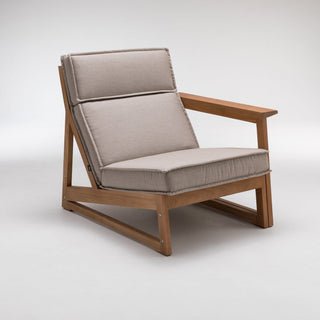 Wooden outdoor armchair with beige cushions.