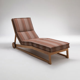 Wooden lounge chair with striped cushions on a white background