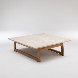 Square coffee table with light wood top and legs.