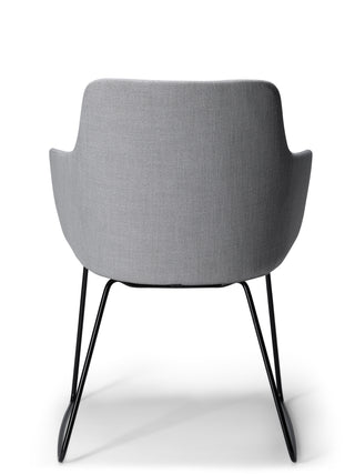 Gray chair with black metal legs on a white background