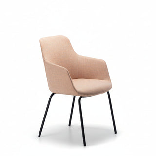 Peach chair with black metal legs on a white background