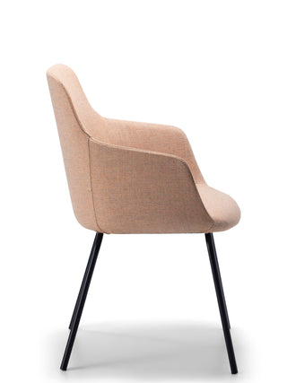 Peach chair with black legs on a white background