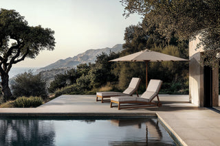 TanGuor Residence I pool with chaise lounges and ocean view