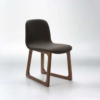 Chair with dark brown seat and wooden legs on a white background