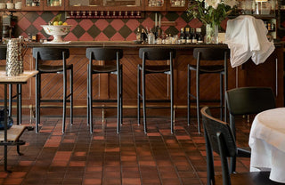 Bar chairs at a restaurant bar.