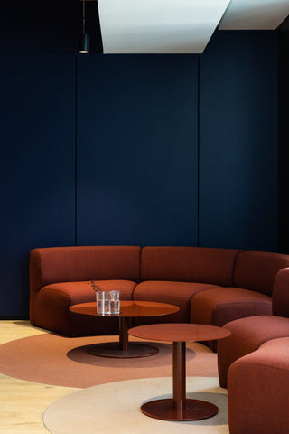 GEYER 201 George St. office lounge with orange sofa and tables