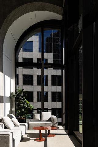 GEYER 201 George Street interior with seating and city view.