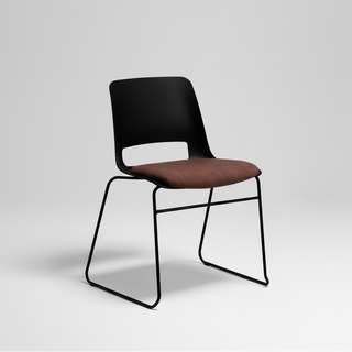 Black chair with a brown seat on a light gray background