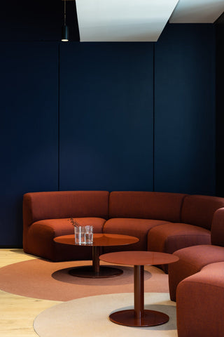 Puffalo Universal lounge seating with tables in modern interior.