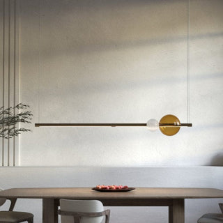 Modern dining room with linear pendant light