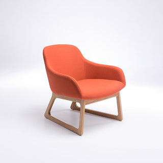 Orange chair with wooden legs on a white background