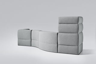 Gray modular sofa against a white background.