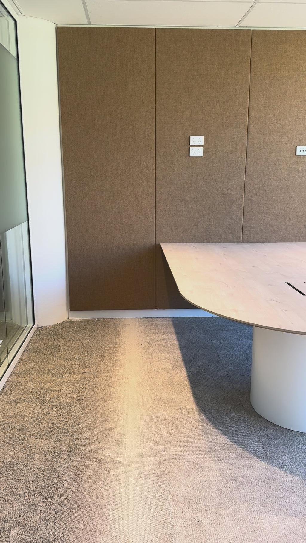 Drum base against a Beige acoustic wall