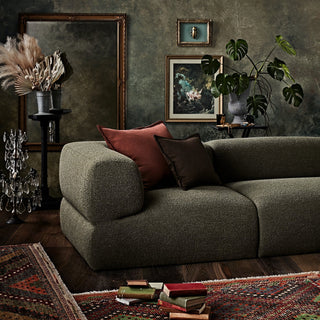 Puffalolounge couch with decor and rug