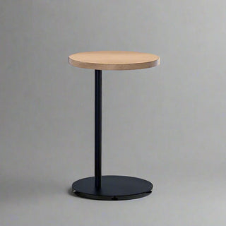 Round side table with black base and wood top