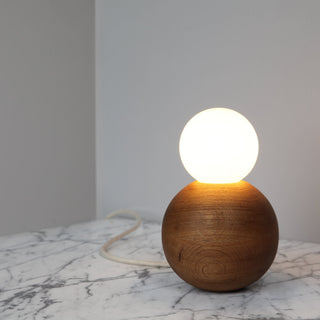 BrightBeads sphere table lamp on marble surface