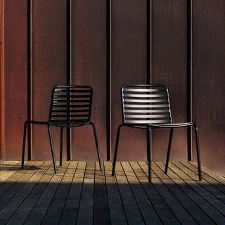 Didier Bombala Out 17 - Two black outdoor chairs