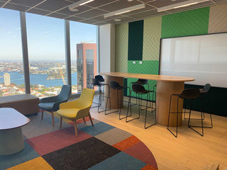 Modern office space with drum table and city view