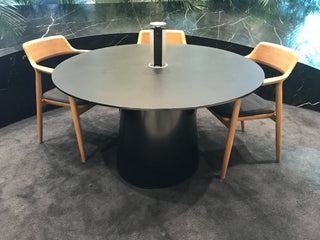 Round table with three chairs.