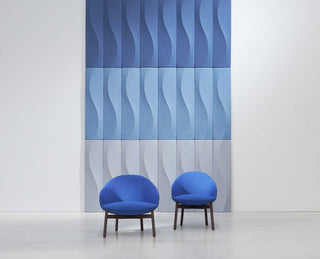 Marina Mini Blue Duo chairs in front of textured blue wall