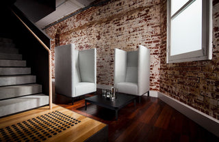 modern chairs in brick interior