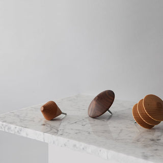 Wallhook14 wooden tops on marble surface