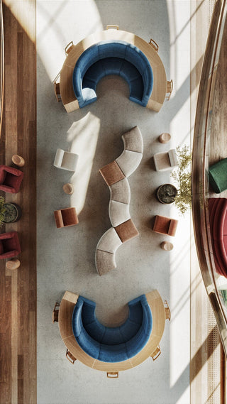 Overhead view of seating area with curved couches and chairs.